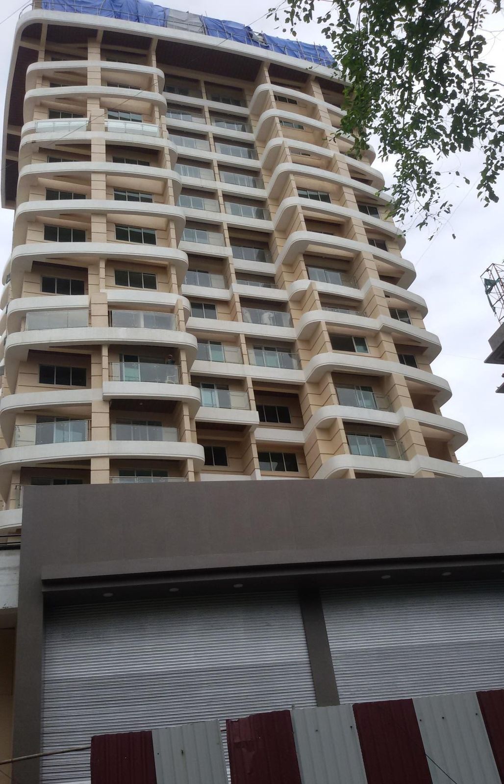 Multi-storey commercial building facade after exterior repair and painting