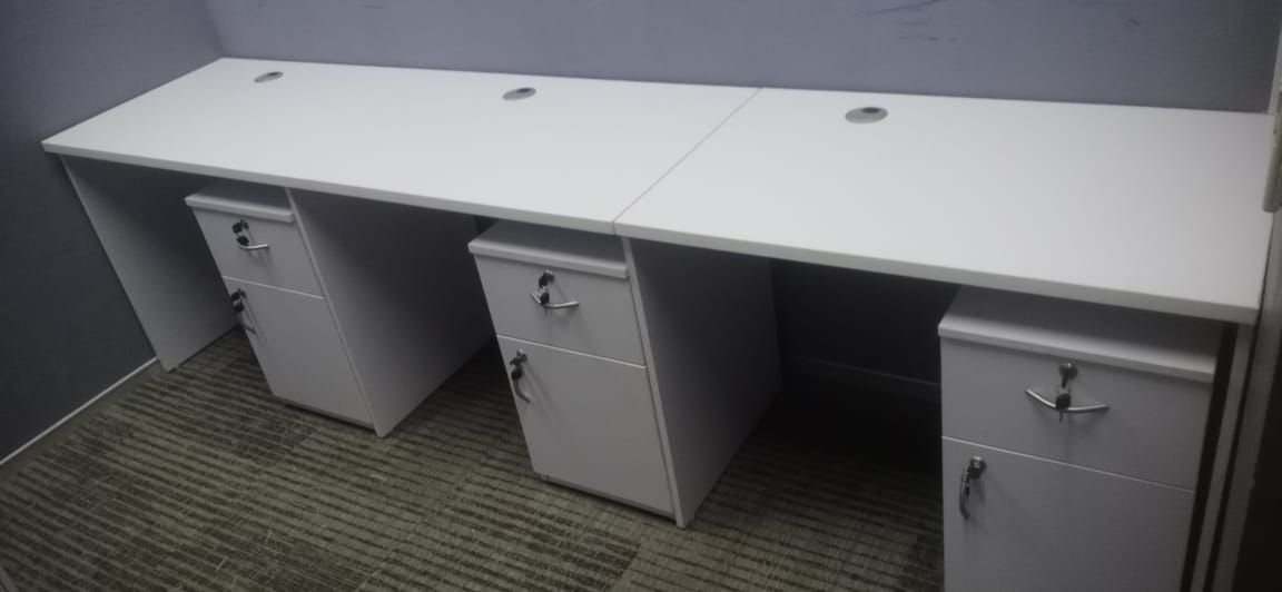 White workstations with lockable pedestal drawers installed for Dachser